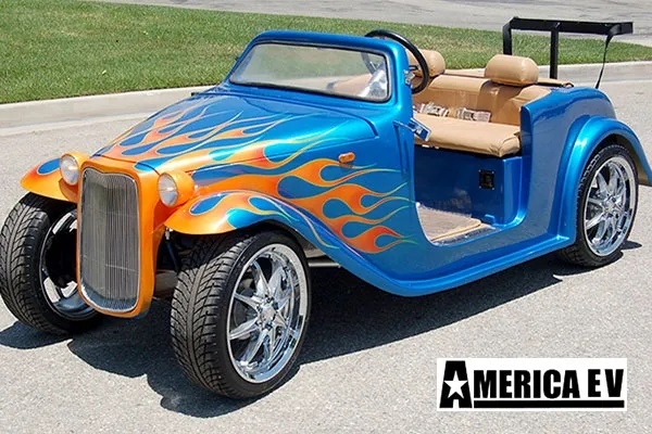 Blue California Roadster with Orange Flames affordable golf cart rental, golf cart rent laguna woods golf cart rental