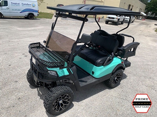 Mint Aluma 4 Passenger Lifted Golf Cart affordable golf cart rental, golf cart rent laguna woods golf cart rental