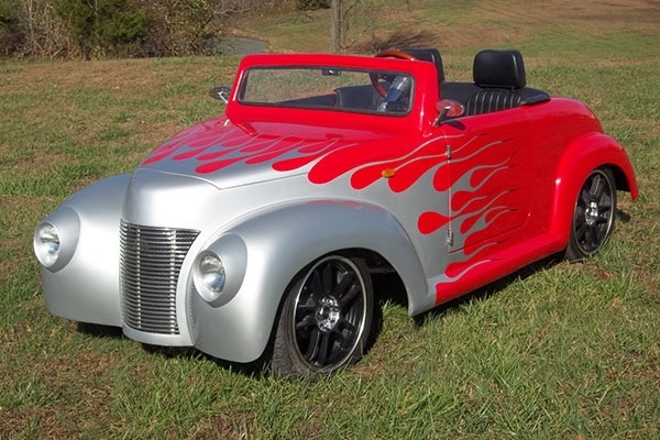 Red 39 Roadster with Silver Flames affordable golf cart rental, golf cart rent laguna woods golf cart rental