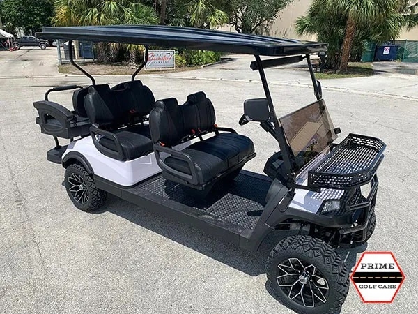 White Aluma 6 Passenger Lifted Golf Cart affordable golf cart rental, golf cart rent laguna woods golf cart rental
