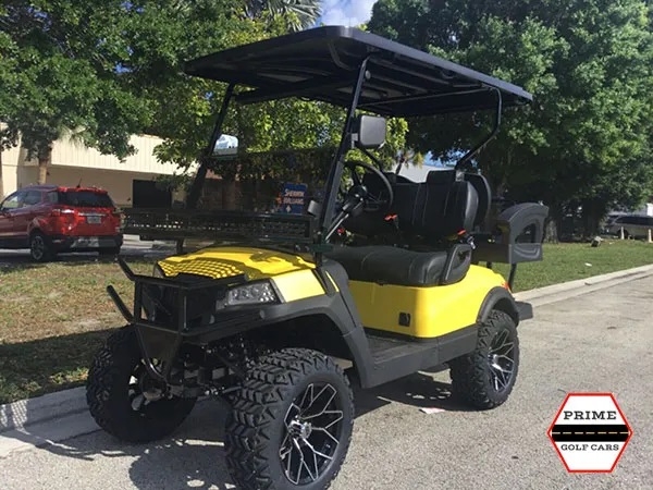 Yellow Aluma 4 Passenger Lifted Golf Cart affordable golf cart rental, golf cart rent laguna woods golf cart rental